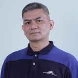 Photo of John Sam, Senior Partner