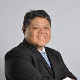 Photo of John Sam, Senior Partner